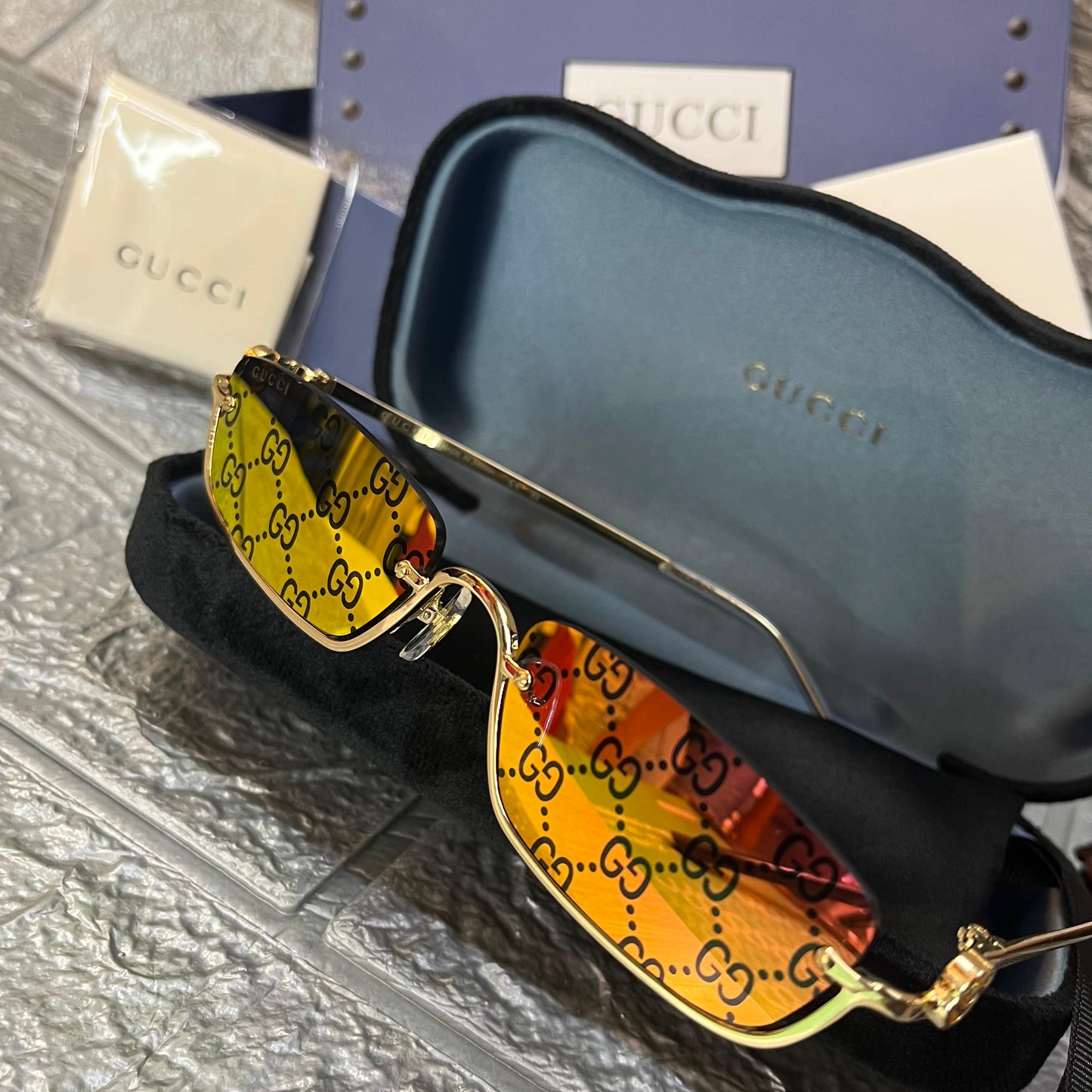 Gucci GG Pattern Rimless Gold