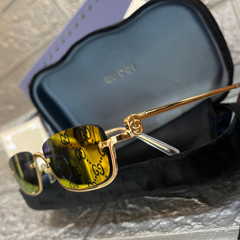 Gucci GG Pattern Rimless Gold